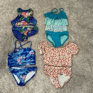 Four swimsuits size little girl 4-5